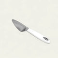 Our stainless steel cake server with a white handle is perfect for serving cakes and desserts. Durable, comfortable, and stylish, ideal for any occasion.