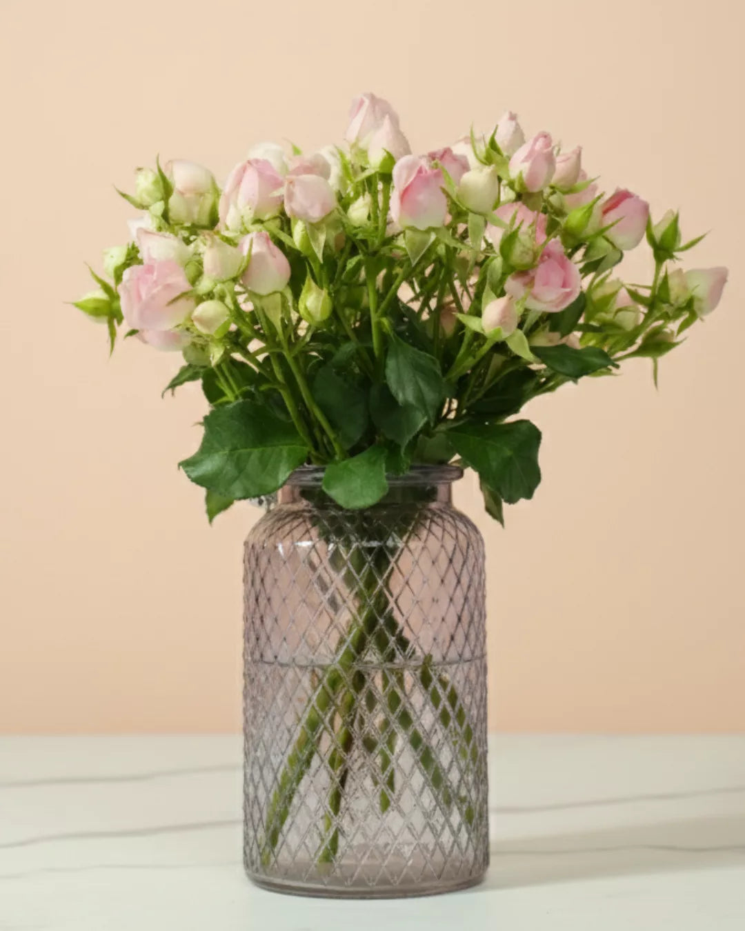 baby roses in textured glass vase fresh baby rose flower arrangement textured glass vase floral centerpiece elegant baby rose décor