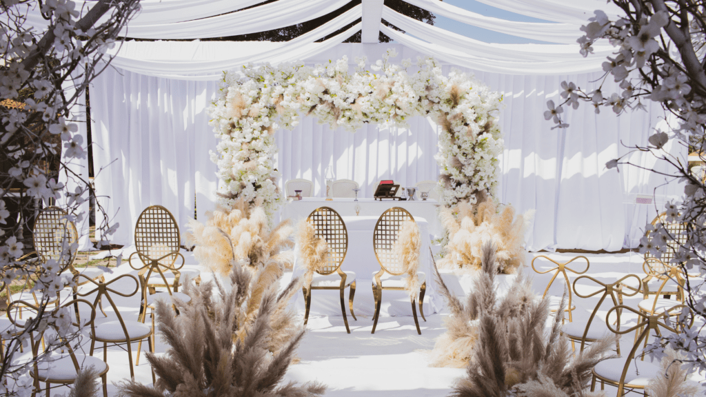 flower arrangements and flower arch in a wedding event