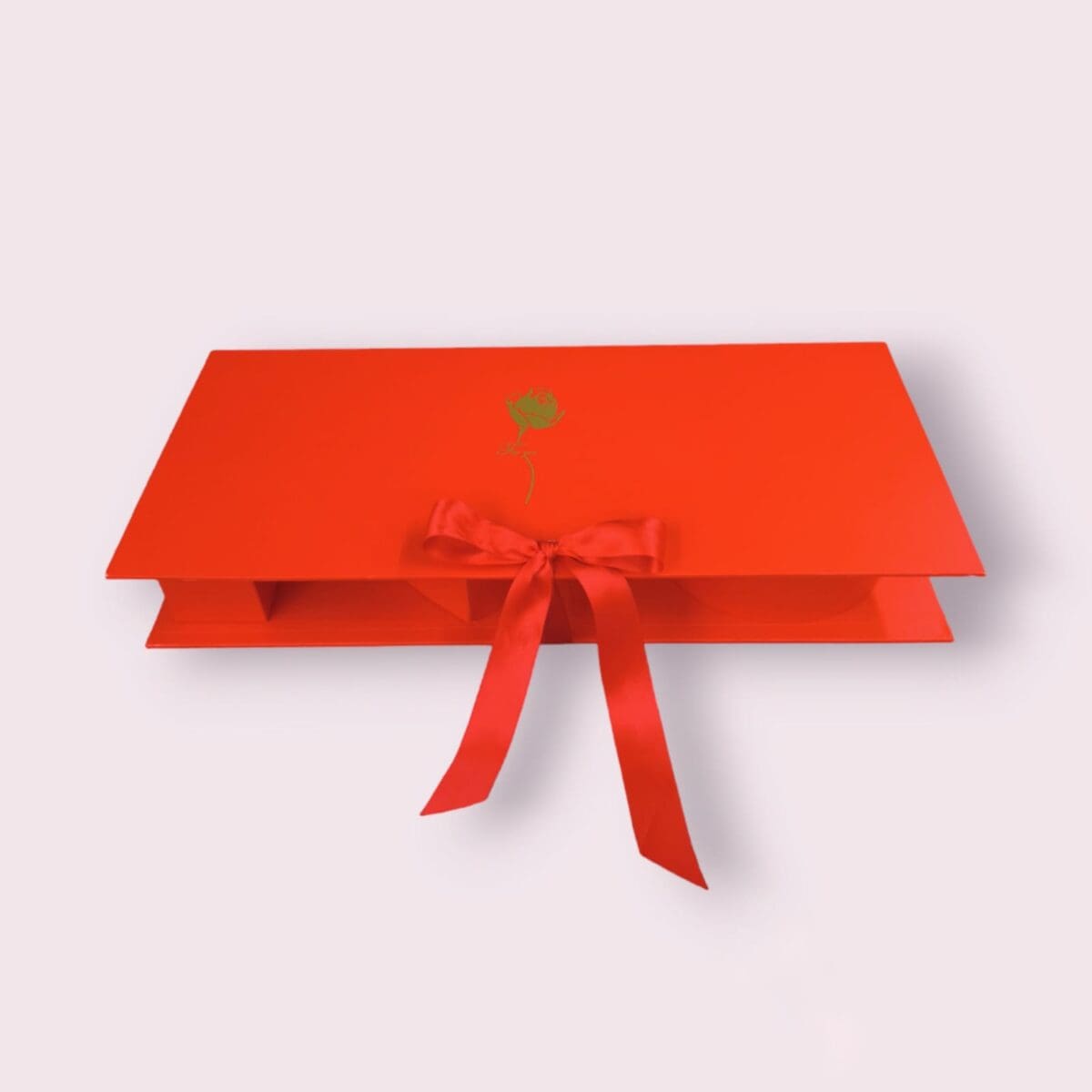 Our Red Compartmented Heart Gift Box is perfect for romantic occasions. With multiple compartments, it's ideal for organizing and presenting chocolates, jewelry, and other small gifts.