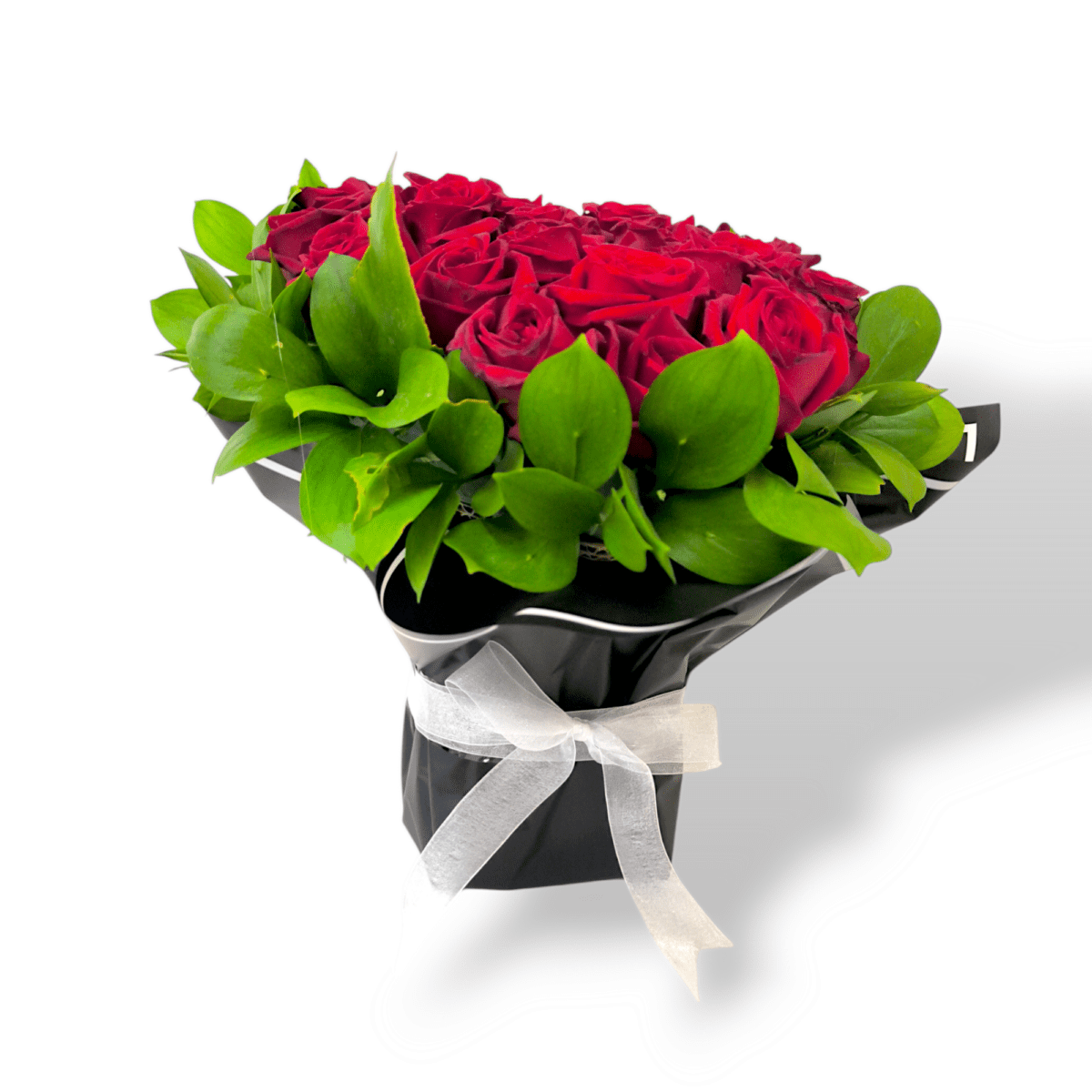 Heart-shaped red rose bouquet, 30 red roses with green leaves, romantic floral arrangement, Valentine’s Day rose bouquet, elegant heart bouquet