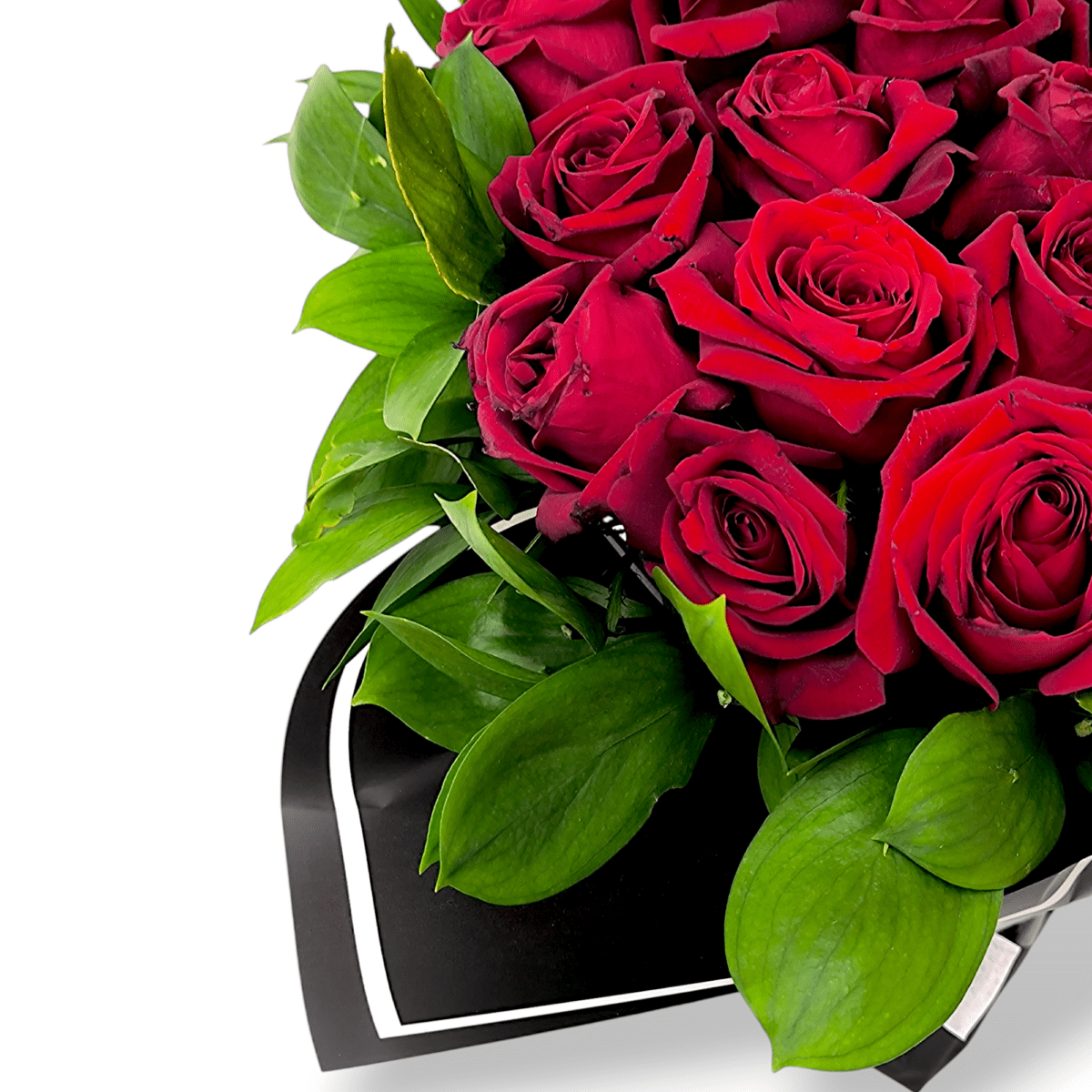 Heart-shaped red rose bouquet, 30 red roses with green leaves, romantic floral arrangement, Valentine’s Day rose bouquet, elegant heart bouquet