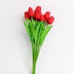 Artificial red tulip bouquet with 10 lifelike stems and green leaves