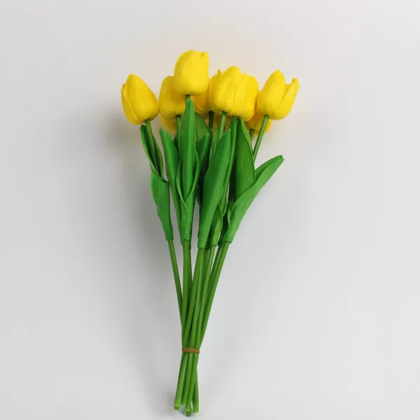 Artificial yellow tulip bouquet with 10 lifelike stems and green leaves