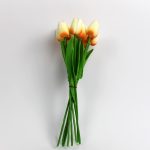 Artificial tulip bouquet with 10 lifelike stems and green leaves