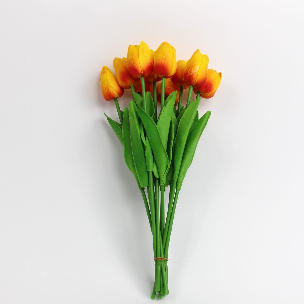 Artificial tulip bouquet with 10 lifelike stems and green leaves